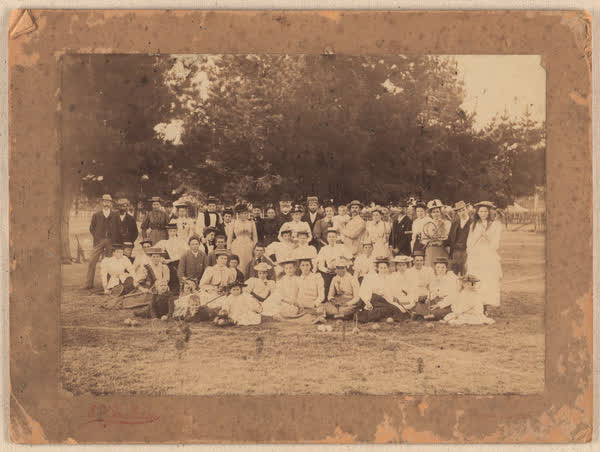 Group portrait at an outdoor event, 1899