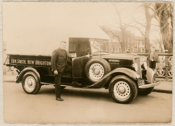 Ern Smith with a truck, 1900