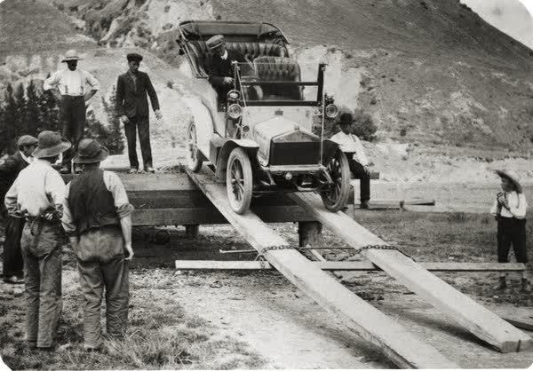 First car crossing Hanmer Bridge, 1900