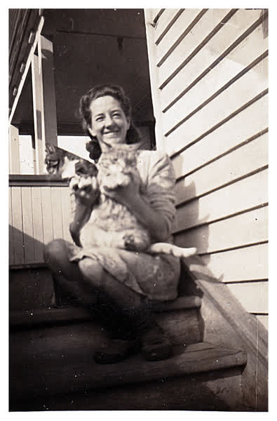 Woman with two cats, 1940