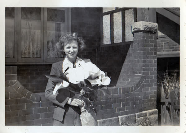 Jenn with flowers, 1940