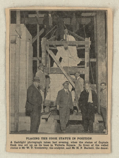 Cook statue scrapbook newspaper image, 1920