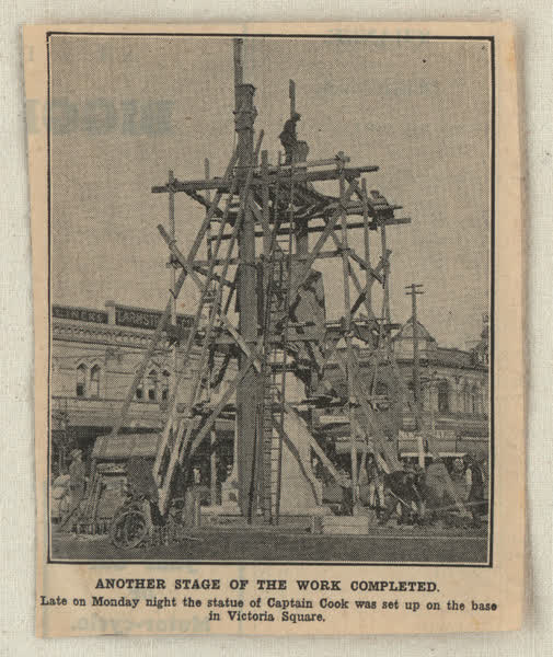 Cook statue scrapbook newspaper image, 1932