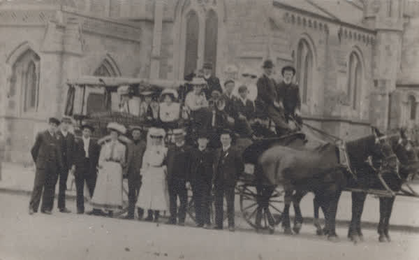 Group portrait outside the ChristChurch Cathedral, 1900