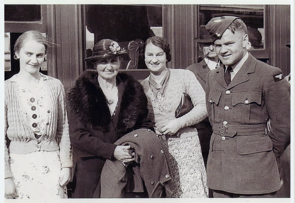 Family portrait beside a train, 1942