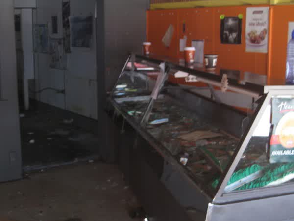 Shattered food cabinet in a closed restaurant, 2009