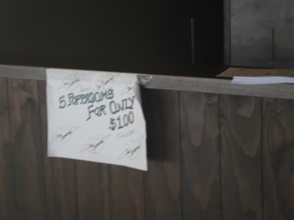Handwritten sign in vacant restaurant, 2009