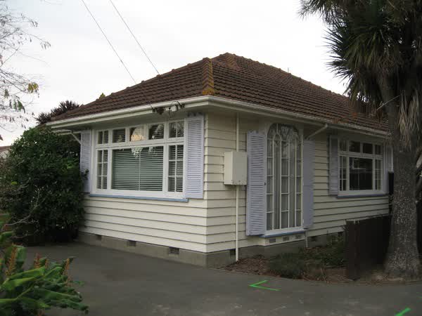 Weatherboard house with wooden shutters, 2007