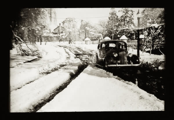 Car driving through snow, 1945