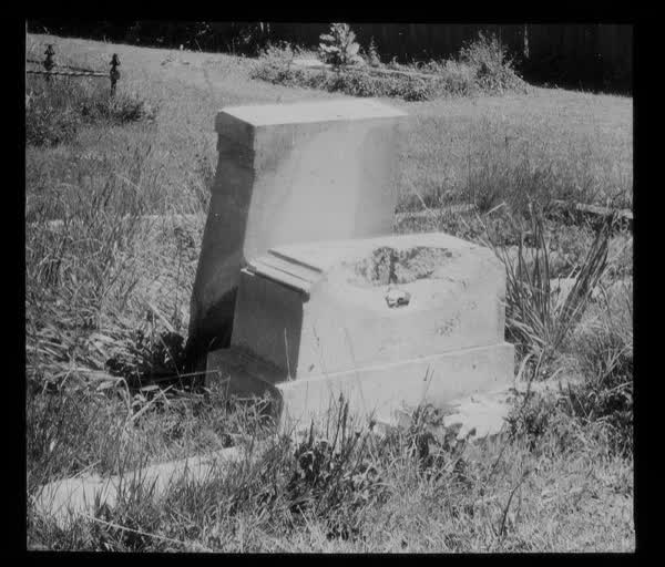 Damaged headstone, 1945