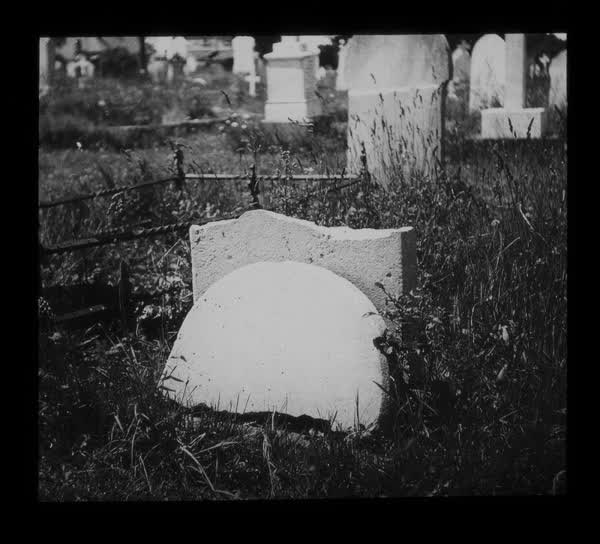 Broken headstone, 1945