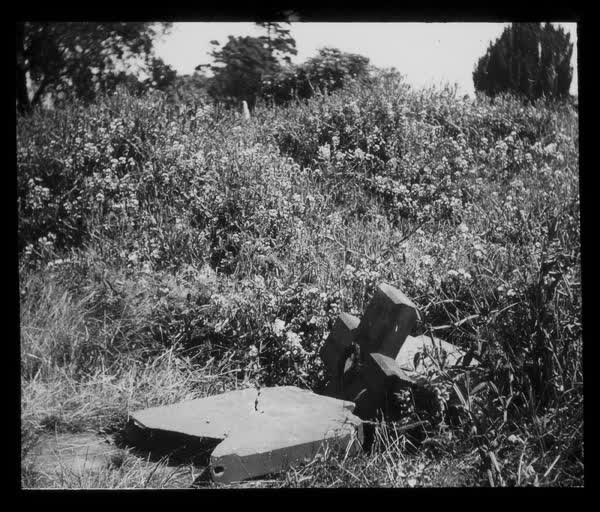 Cracked headstone, 1945