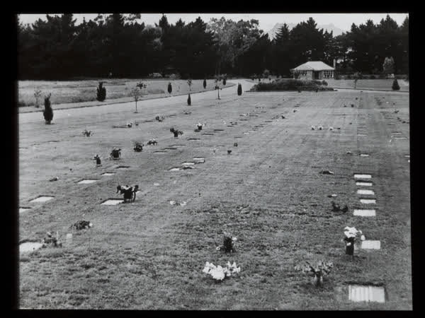 Memorial plaques in lawn cemetery, 1940