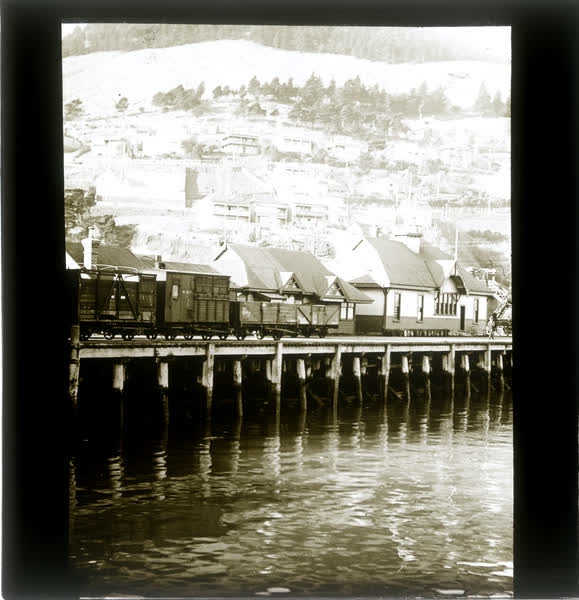 Lyttelton Customs office and railway wagons, 1920