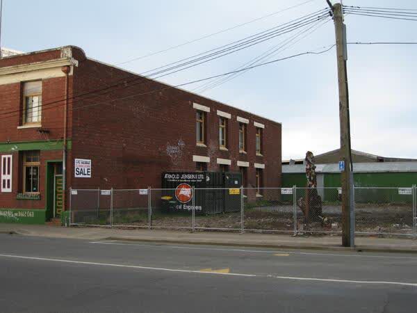 Side of CRC Salvage warehouse and a vacant section, 2009