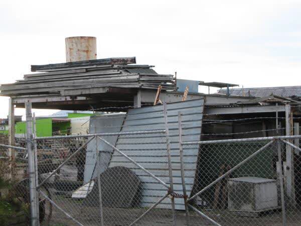 Building supplies stacked at CRC Salvage, 2009